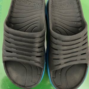 Hoka slides. Size 7. Runs big. Great to slip on after a workout or beach